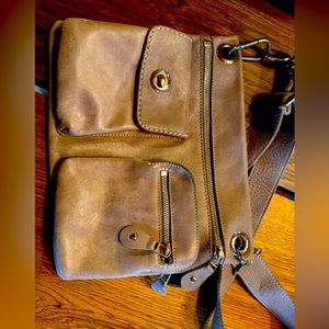 Roots cross body bag